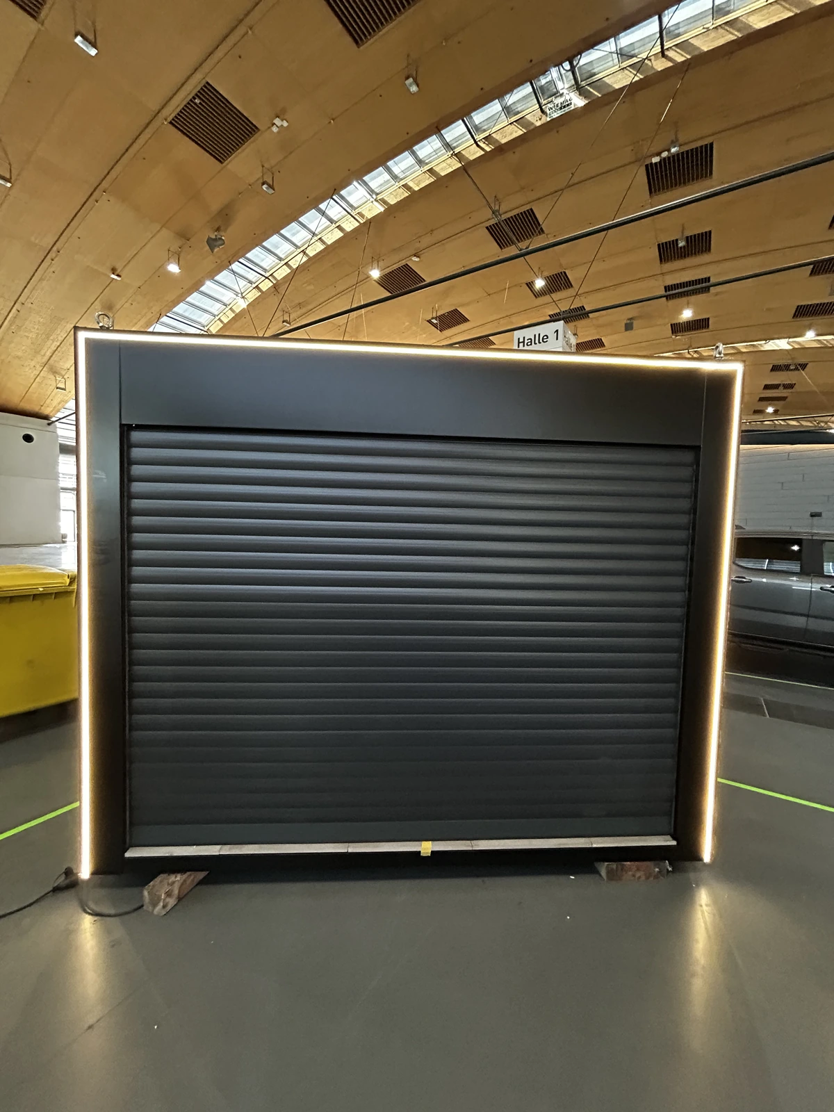 Outdoor kitchen with closed roller shutter