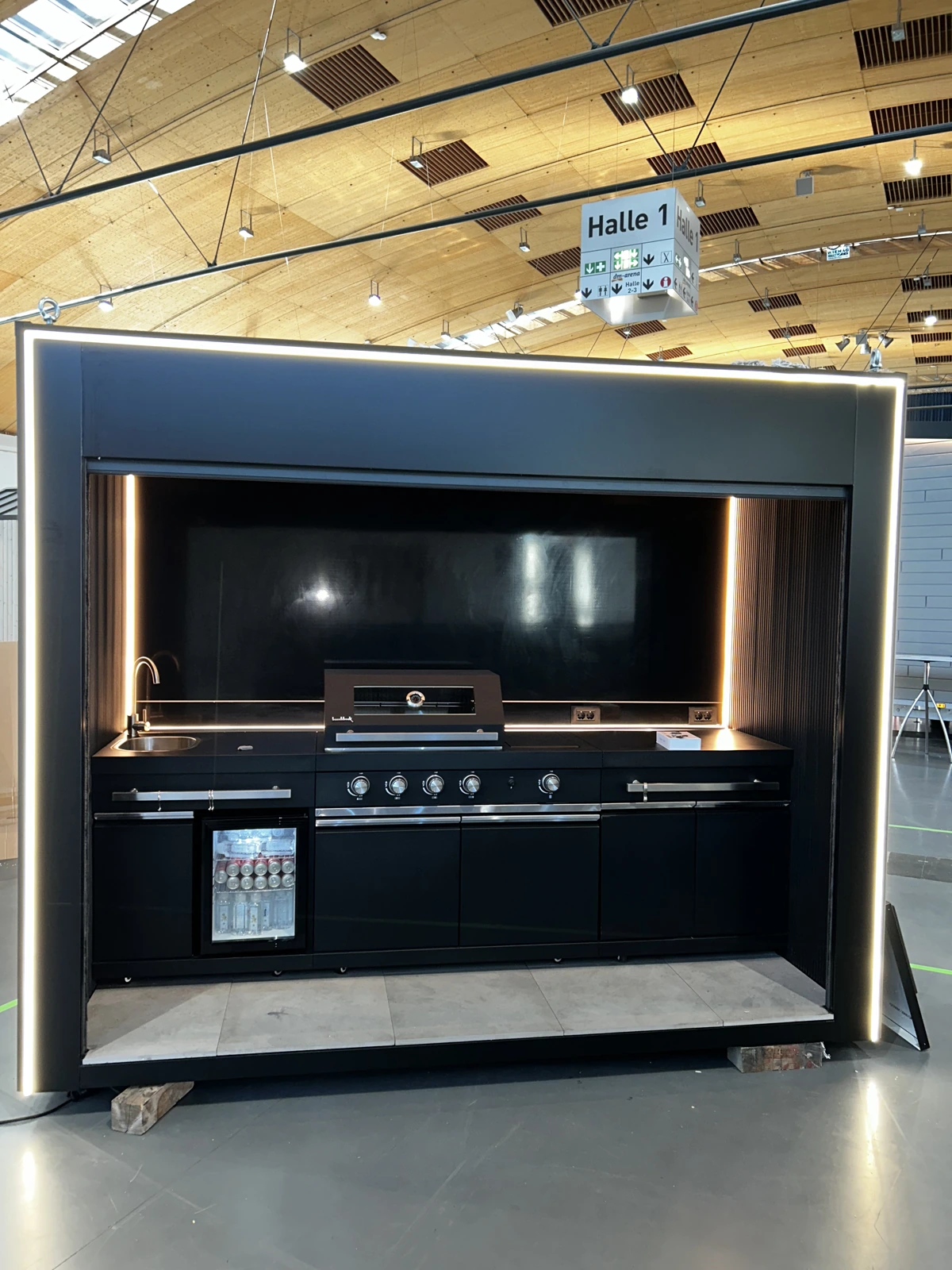 Outdoor kitchen with illuminated frame
