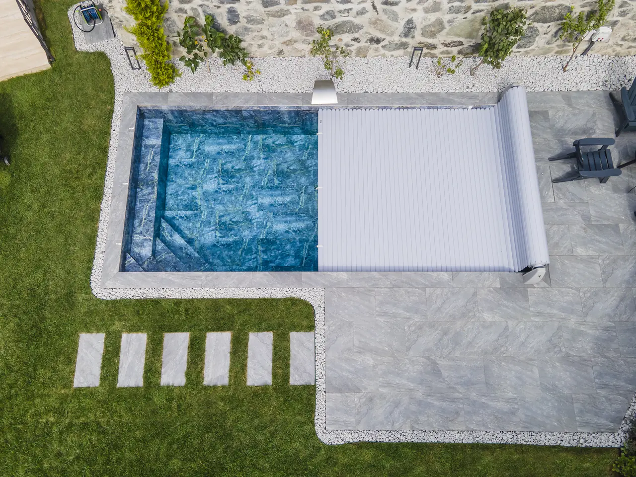 Partially open slatted cover viewed from above – No1Pool